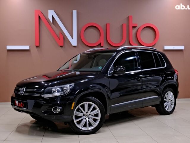Черный Фольксваген Тигуан, объемом двигателя 2 л и пробегом 195 тыс. км за 11900 $, фото 1 на Automoto.ua