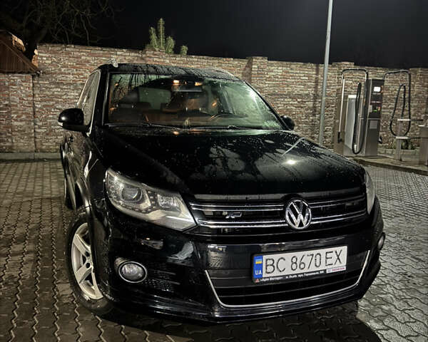 Чорний Фольксваген Тігуан, об'ємом двигуна 2 л та пробігом 291 тис. км за 17000 $, фото 1 на Automoto.ua