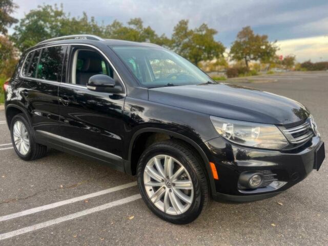 Черный Фольксваген Тигуан, объемом двигателя 2 л и пробегом 87 тыс. км за 8500 $, фото 1 на Automoto.ua