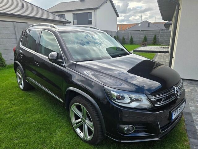 Черный Фольксваген Тигуан, объемом двигателя 1.4 л и пробегом 170 тыс. км за 8650 $, фото 1 на Automoto.ua