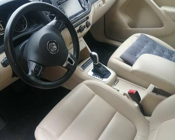 Чорний Фольксваген Тігуан, об'ємом двигуна 2 л та пробігом 99 тис. км за 15000 $, фото 1 на Automoto.ua