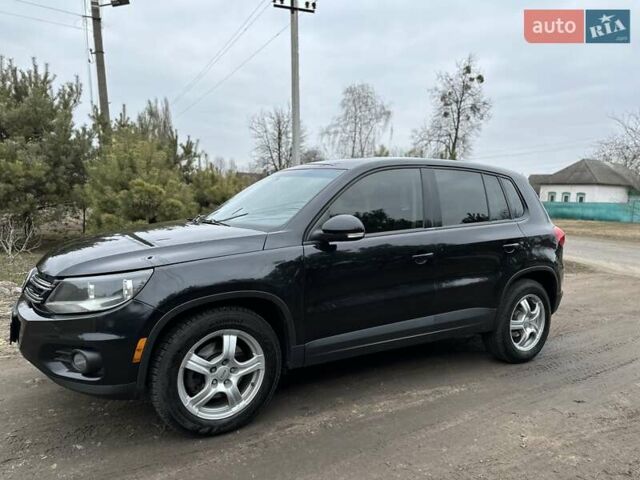 Черный Фольксваген Тигуан, объемом двигателя 1.98 л и пробегом 180 тыс. км за 12800 $, фото 1 на Automoto.ua