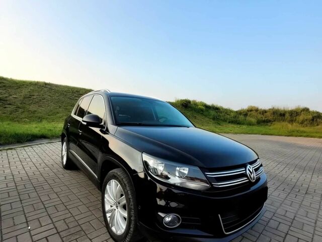 Черный Фольксваген Тигуан, объемом двигателя 2 л и пробегом 75 тыс. км за 7900 $, фото 1 на Automoto.ua