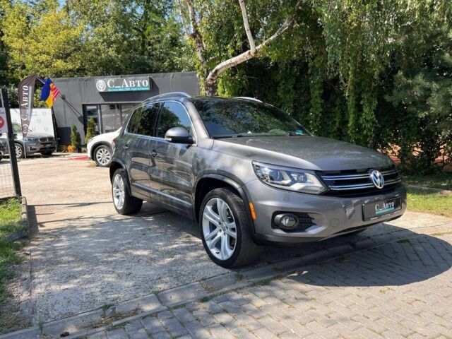 Черный Фольксваген Тигуан, объемом двигателя 1.8 л и пробегом 170 тыс. км за 12700 $, фото 1 на Automoto.ua