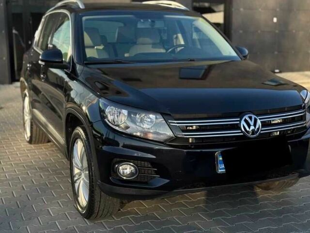 Черный Фольксваген Тигуан, объемом двигателя 2 л и пробегом 151 тыс. км за 9500 $, фото 1 на Automoto.ua