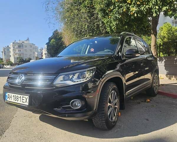 Черный Фольксваген Тигуан, объемом двигателя 2 л и пробегом 201 тыс. км за 14000 $, фото 1 на Automoto.ua