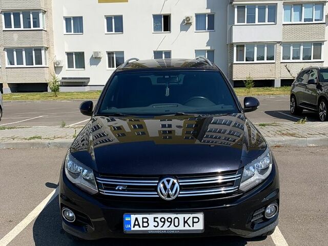 Черный Фольксваген Тигуан, объемом двигателя 2 л и пробегом 230 тыс. км за 12000 $, фото 1 на Automoto.ua