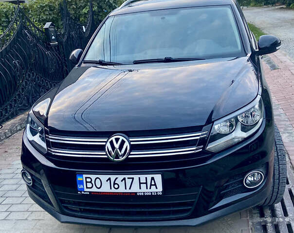 Черный Фольксваген Тигуан, объемом двигателя 1.98 л и пробегом 155 тыс. км за 12800 $, фото 1 на Automoto.ua