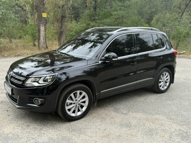 Чорний Фольксваген Тігуан, об'ємом двигуна 2 л та пробігом 97 тис. км за 20500 $, фото 1 на Automoto.ua
