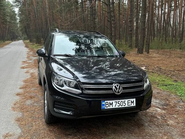 Черный Фольксваген Тигуан, объемом двигателя 2 л и пробегом 240 тыс. км за 12200 $, фото 1 на Automoto.ua