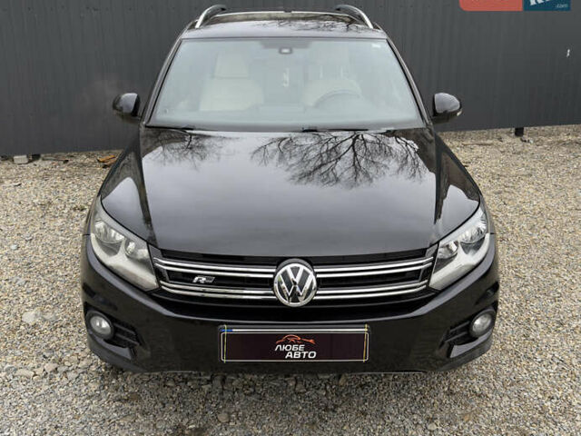 Чорний Фольксваген Тігуан, об'ємом двигуна 1.98 л та пробігом 146 тис. км за 12800 $, фото 1 на Automoto.ua