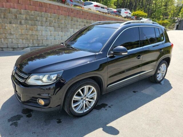 Чорний Фольксваген Тігуан, об'ємом двигуна 2 л та пробігом 125 тис. км за 3850 $, фото 1 на Automoto.ua