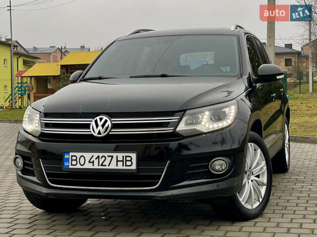 Чорний Фольксваген Тігуан, об'ємом двигуна 2 л та пробігом 223 тис. км за 16950 $, фото 1 на Automoto.ua