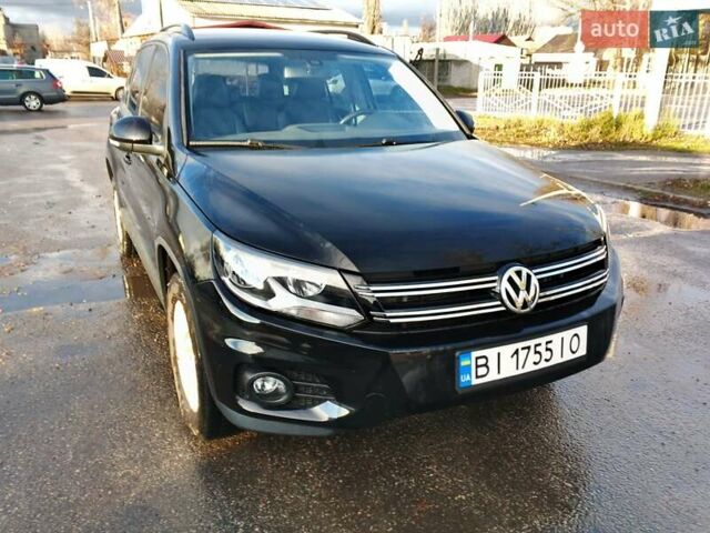 Черный Фольксваген Тигуан, объемом двигателя 1.98 л и пробегом 83 тыс. км за 12800 $, фото 1 на Automoto.ua