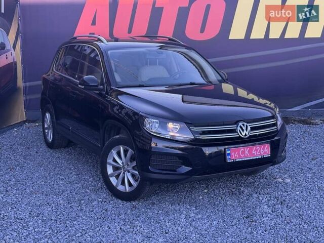 Чорний Фольксваген Тігуан, об'ємом двигуна 1.98 л та пробігом 155 тис. км за 13500 $, фото 1 на Automoto.ua