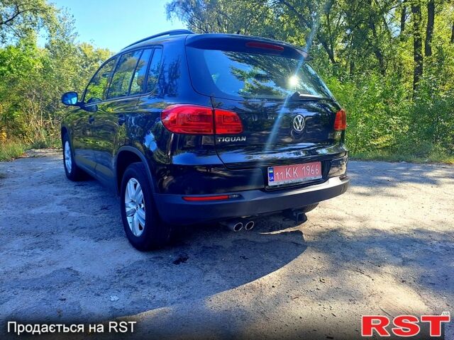 Черный Фольксваген Тигуан, объемом двигателя 2 л и пробегом 182 тыс. км за 14000 $, фото 1 на Automoto.ua