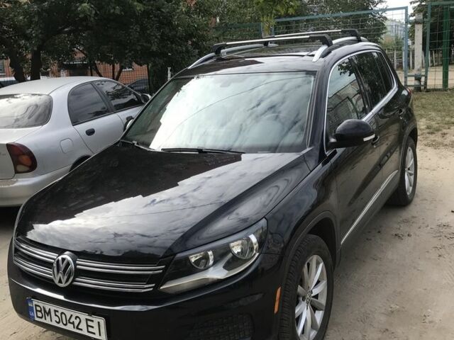 Черный Фольксваген Тигуан, объемом двигателя 2 л и пробегом 131 тыс. км за 14000 $, фото 1 на Automoto.ua