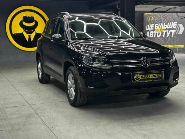 Чорний Фольксваген Тігуан, об'ємом двигуна 2 л та пробігом 133 тис. км за 14400 $, фото 1 на Automoto.ua