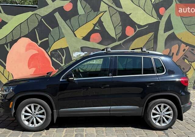 Чорний Фольксваген Тігуан, об'ємом двигуна 1.98 л та пробігом 119 тис. км за 14500 $, фото 1 на Automoto.ua