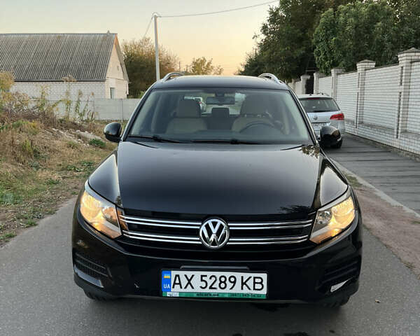 Черный Фольксваген Тигуан, объемом двигателя 1.98 л и пробегом 73 тыс. км за 16000 $, фото 1 на Automoto.ua