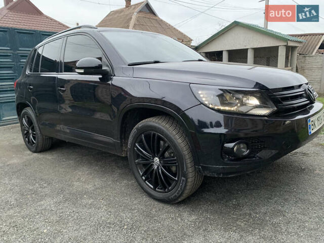 Черный Фольксваген Тигуан, объемом двигателя 2 л и пробегом 148 тыс. км за 13500 $, фото 1 на Automoto.ua