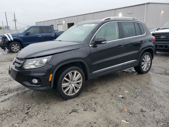 Черный Фольксваген Тигуан, объемом двигателя 2 л и пробегом 125 тыс. км за 8900 $, фото 1 на Automoto.ua