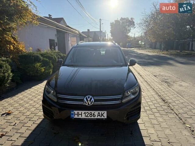 Черный Фольксваген Тигуан, объемом двигателя 1.98 л и пробегом 150 тыс. км за 15000 $, фото 1 на Automoto.ua
