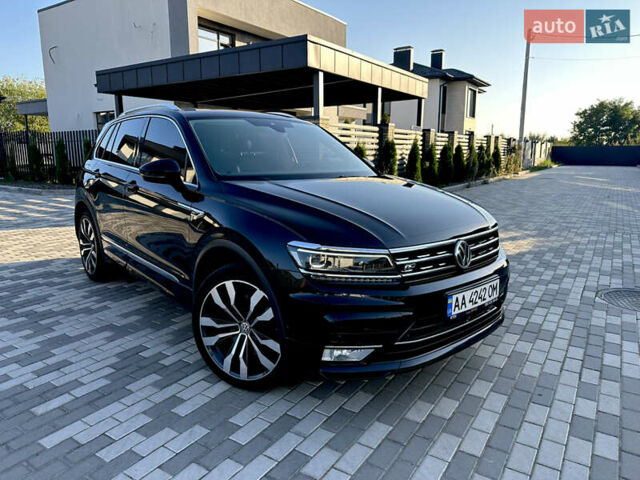 Черный Фольксваген Тигуан, объемом двигателя 2 л и пробегом 232 тыс. км за 26800 $, фото 1 на Automoto.ua