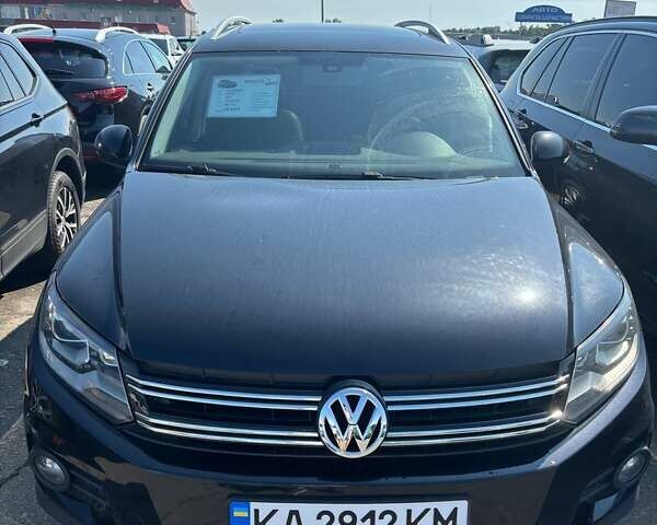 Чорний Фольксваген Тігуан, об'ємом двигуна 1.98 л та пробігом 180 тис. км за 14500 $, фото 1 на Automoto.ua