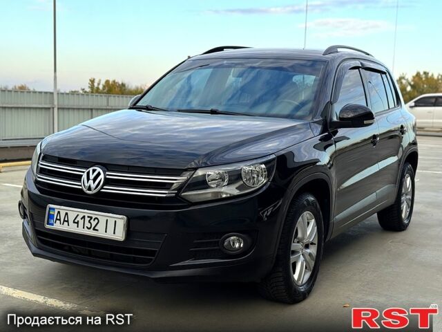 Чорний Фольксваген Тігуан, об'ємом двигуна 2 л та пробігом 184 тис. км за 12450 $, фото 1 на Automoto.ua