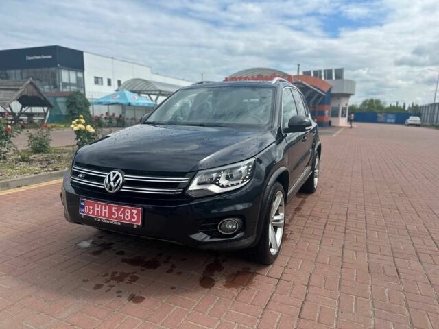 Чорний Фольксваген Тігуан, об'ємом двигуна 2 л та пробігом 220 тис. км за 14000 $, фото 1 на Automoto.ua