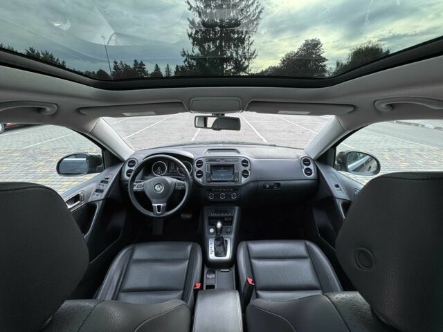 Чорний Фольксваген Тігуан, об'ємом двигуна 2 л та пробігом 157 тис. км за 13499 $, фото 1 на Automoto.ua