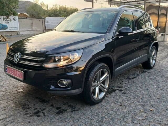 Черный Фольксваген Тигуан, объемом двигателя 2 л и пробегом 127 тыс. км за 13300 $, фото 1 на Automoto.ua