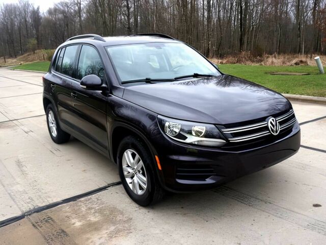 Черный Фольксваген Тигуан, объемом двигателя 2 л и пробегом 75 тыс. км за 13500 $, фото 1 на Automoto.ua