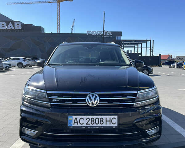 Чорний Фольксваген Тігуан, об'ємом двигуна 1.4 л та пробігом 283 тис. км за 19300 $, фото 1 на Automoto.ua