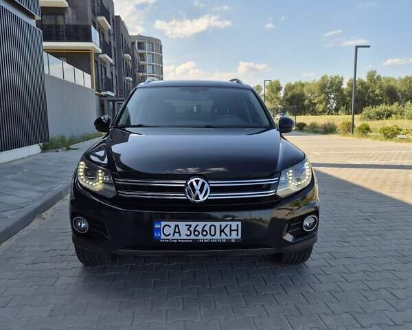 Чорний Фольксваген Тігуан, об'ємом двигуна 1.98 л та пробігом 117 тис. км за 17890 $, фото 1 на Automoto.ua