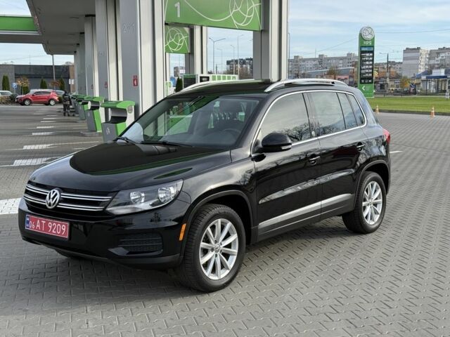 Чорний Фольксваген Тігуан, об'ємом двигуна 2 л та пробігом 104 тис. км за 14800 $, фото 1 на Automoto.ua