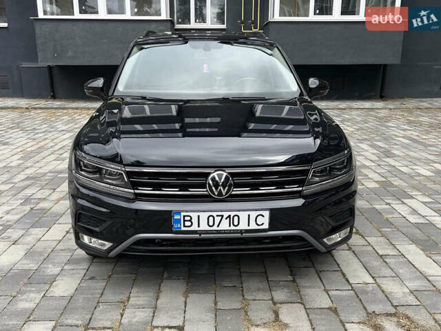 Черный Фольксваген Тигуан, объемом двигателя 1.98 л и пробегом 135 тыс. км за 20700 $, фото 1 на Automoto.ua