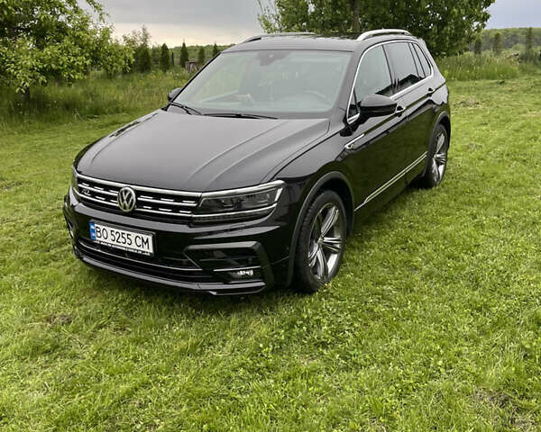 Черный Фольксваген Тигуан, объемом двигателя 1.98 л и пробегом 215 тыс. км за 26855 $, фото 1 на Automoto.ua