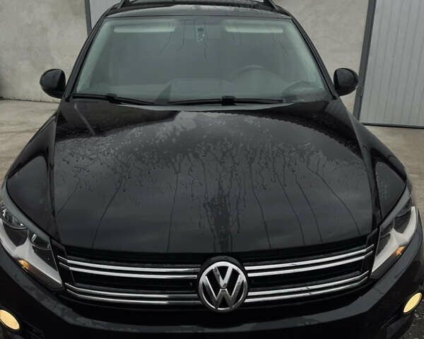 Чорний Фольксваген Тігуан, об'ємом двигуна 1.98 л та пробігом 210 тис. км за 11400 $, фото 1 на Automoto.ua