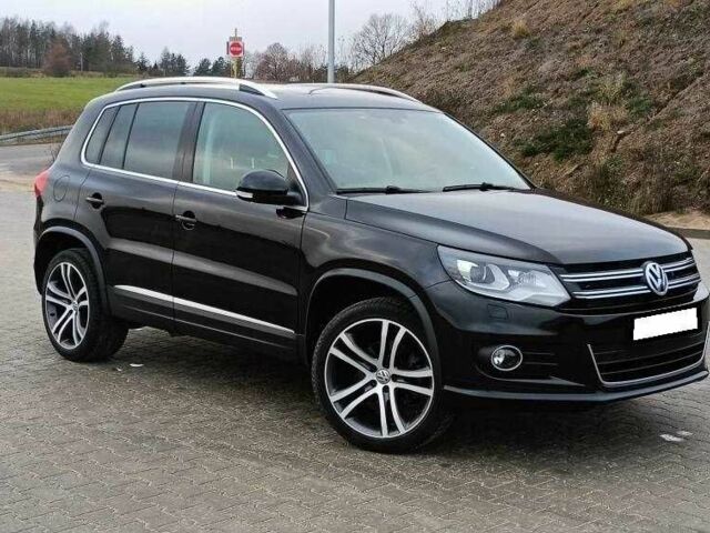 Чорний Фольксваген Тігуан, об'ємом двигуна 2 л та пробігом 82 тис. км за 10300 $, фото 1 на Automoto.ua