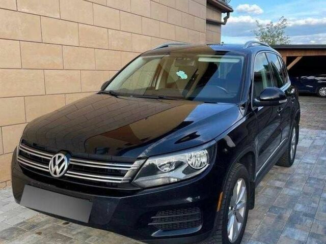 Чорний Фольксваген Тігуан, об'ємом двигуна 2 л та пробігом 153 тис. км за 12000 $, фото 1 на Automoto.ua