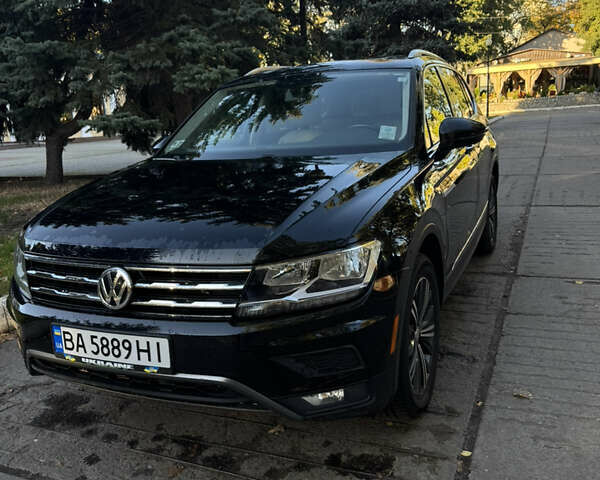 Чорний Фольксваген Тігуан, об'ємом двигуна 1.98 л та пробігом 127 тис. км за 22000 $, фото 1 на Automoto.ua