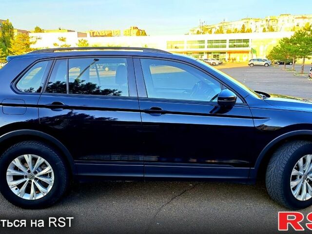 Черный Фольксваген Тигуан, объемом двигателя 2 л и пробегом 177 тыс. км за 20500 $, фото 1 на Automoto.ua