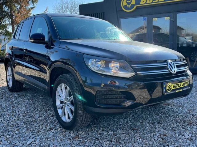 Чорний Фольксваген Тігуан, об'ємом двигуна 2 л та пробігом 142 тис. км за 12200 $, фото 1 на Automoto.ua