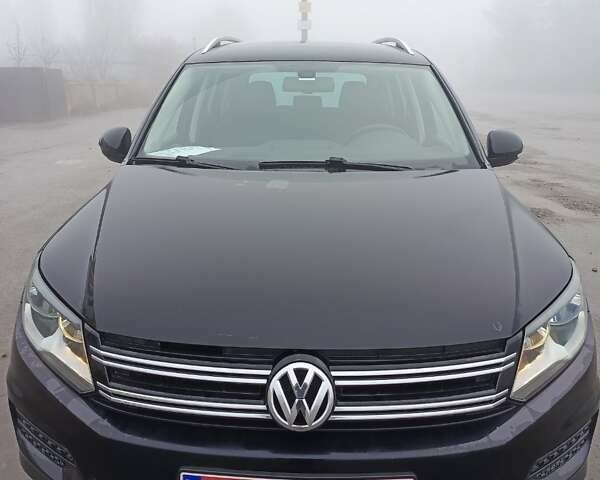 Черный Фольксваген Тигуан, объемом двигателя 1.98 л и пробегом 120 тыс. км за 14700 $, фото 1 на Automoto.ua