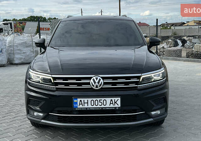 Черный Фольксваген Тигуан, объемом двигателя 1.97 л и пробегом 250 тыс. км за 23500 $, фото 1 на Automoto.ua