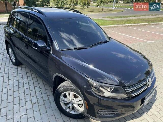 Черный Фольксваген Тигуан, объемом двигателя 1.98 л и пробегом 218 тыс. км за 12800 $, фото 1 на Automoto.ua