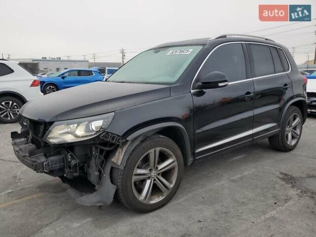 Черный Фольксваген Тигуан, объемом двигателя 1.98 л и пробегом 65 тыс. км за 650 $, фото 1 на Automoto.ua