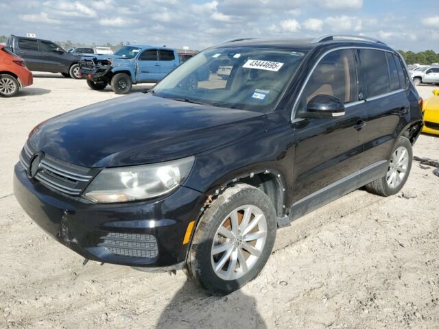 Чорний Фольксваген Тігуан, об'ємом двигуна 2 л та пробігом 150 тис. км за 8600 $, фото 1 на Automoto.ua